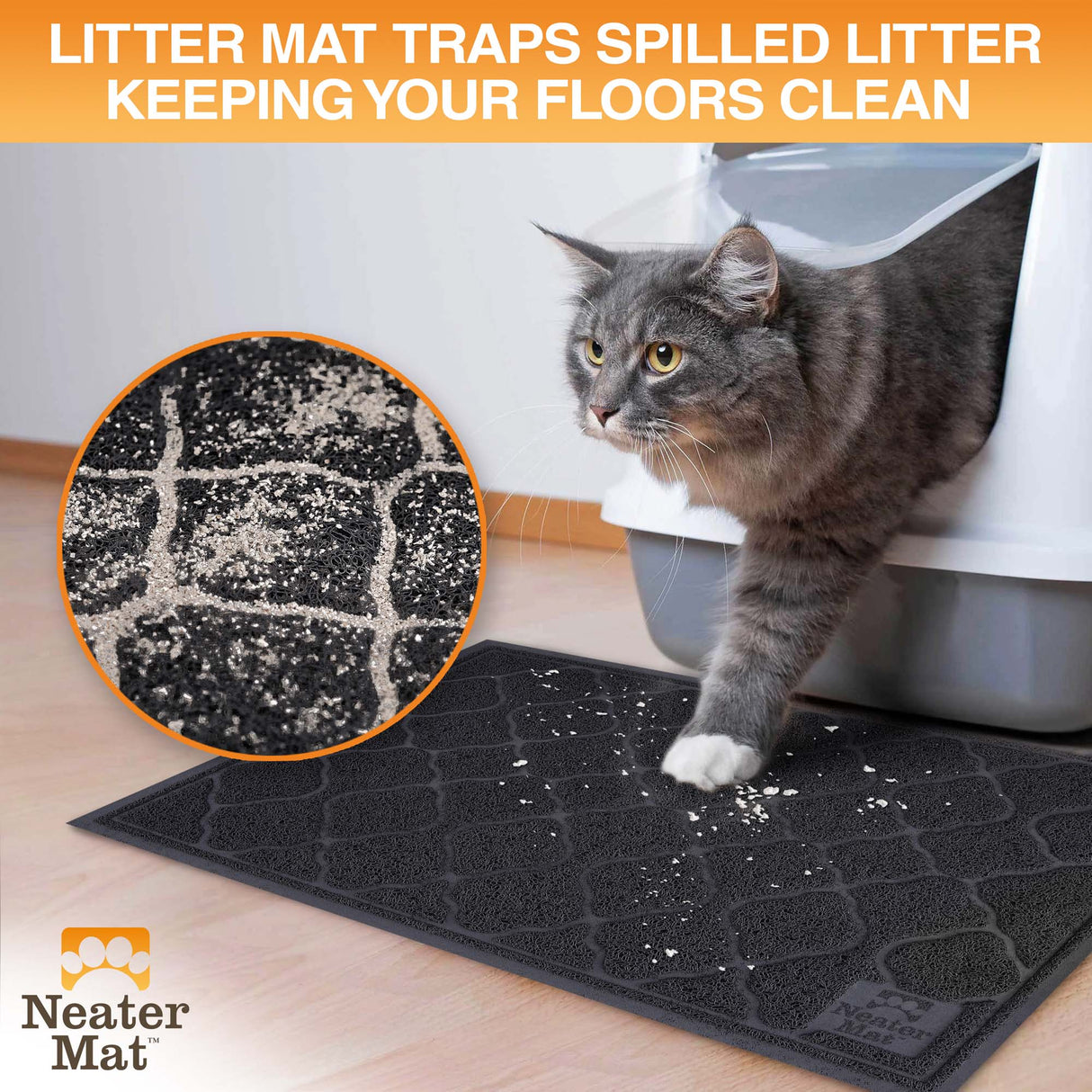 Cat exiting a litter box and stepping on a Neater Mat Litter Mat which traps the litter on their paws.