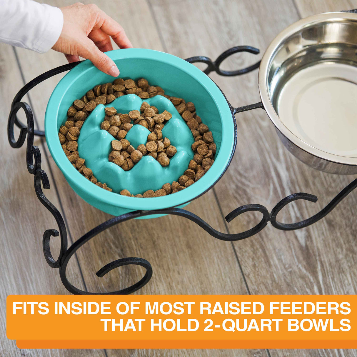 Woman placing The Niner inside the Wrought Iron feeder with text that says the bowl can fit into most raised feeders that hold 2-quart bowls.