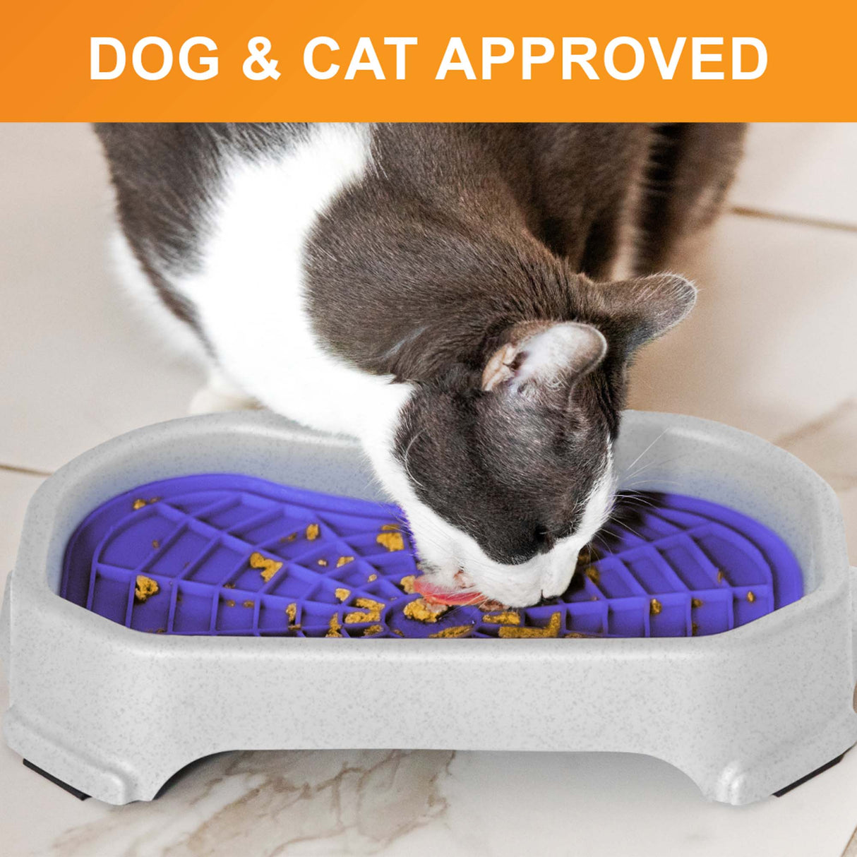 Cat licking food out of the Neat-Lik Mat Slow Feed Licking Mat with the base with text that says "Dog and cat approved."