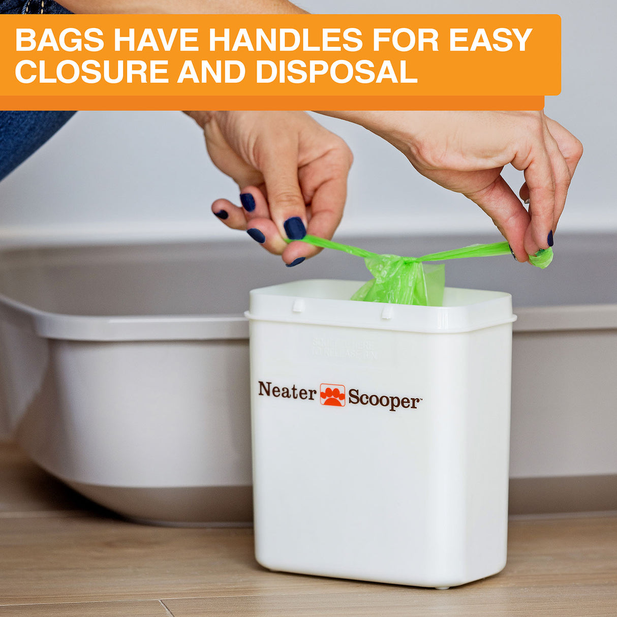 Person tying the waste bag inside the Neater Scooper bin. Text on screen reads: Bags have handles for east closure and disposal.