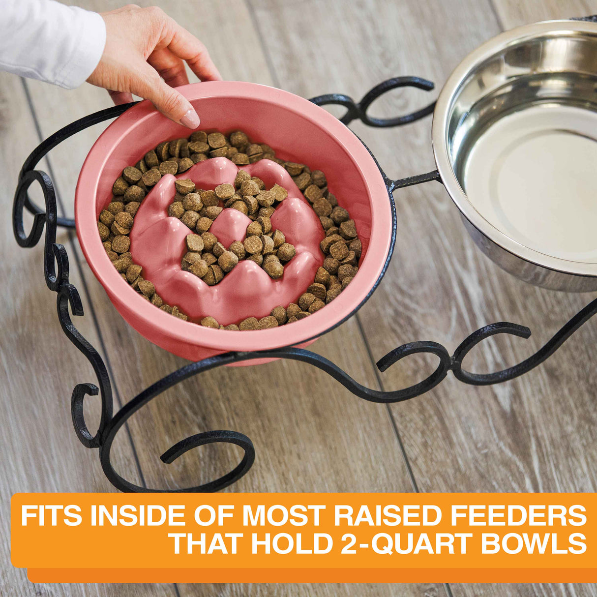 Woman placing The Niner inside the Wrought Iron feeder with text that says the bowl can fit into most raised feeders that hold 2-quart bowls.