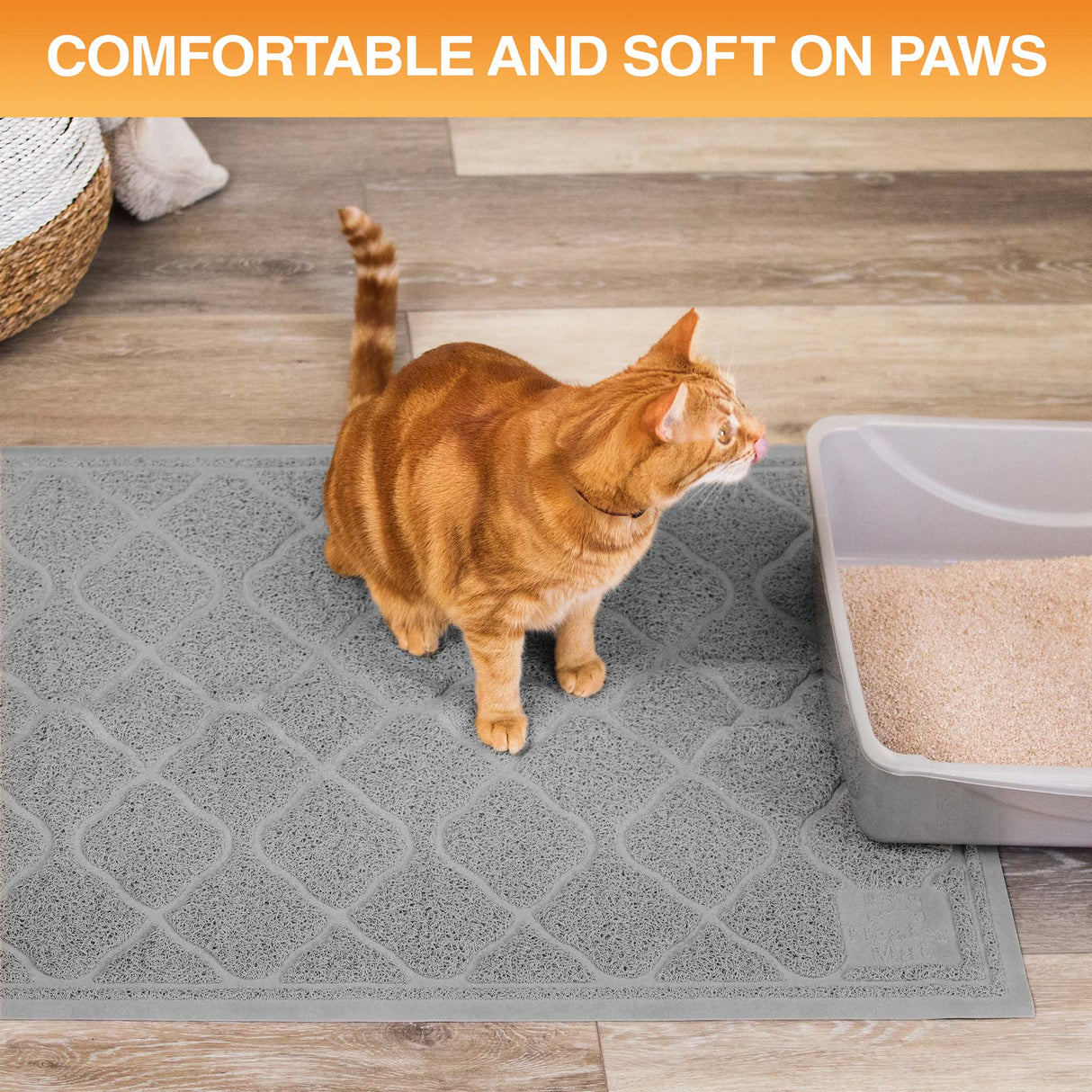 Cat standing on a textured mat next to a litter box with text 'Comfortable and soft on paws'.