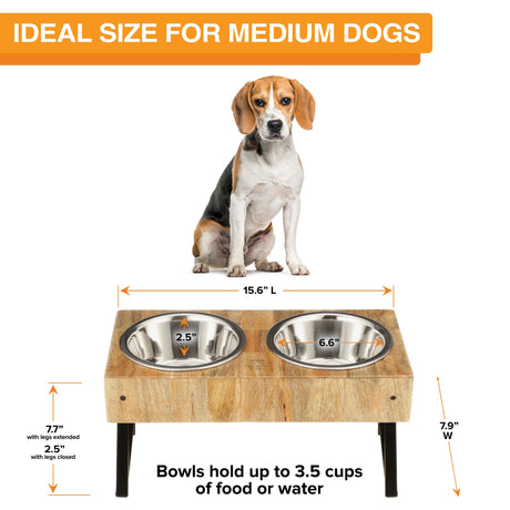 A medium-sized dog is seated behind the medium wooden feeder, displaying the dimensions. Text on screen reads: Ideal size for medium dogs.