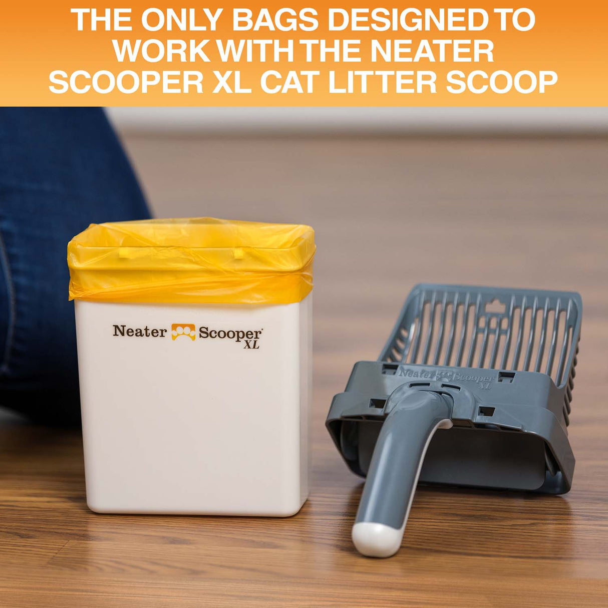 Image of the Neater Scooper XL bin with the top lying on the wooden floor next to it. Text on screen reads: The only bags designed to work with the Neater Scooper XL Cat Litter Scoop.
