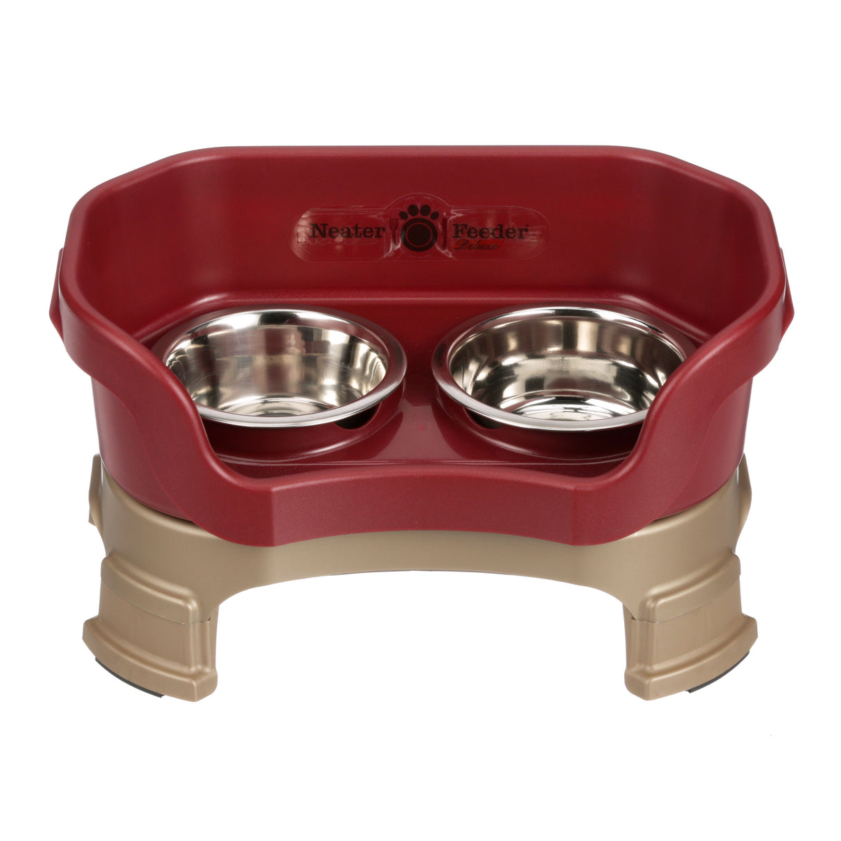 Neater Feeder Deluxe small with leg extensions in Cranberry with two stainless steel bowls against a white background.