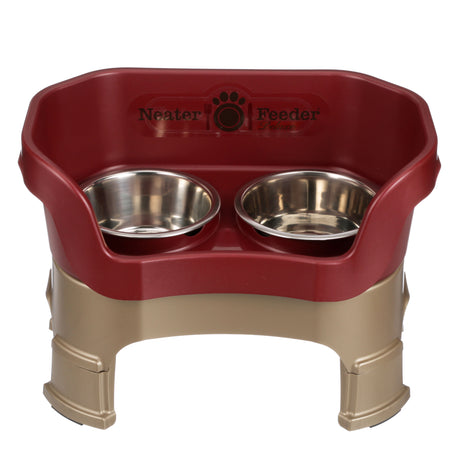 Deluxe medium Neater Feeder in Cranberry with leg extensions with two stainless steel bowls against a white background.