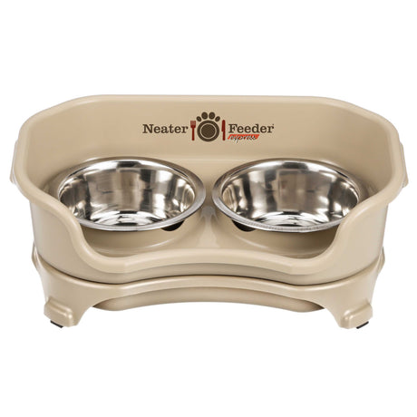 Small almond EXPRESS Neater Feeder with two stainless steel bowls against a white background.