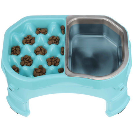 The Double Diner with the stainless steel insert with kibble and water inside the feeder against a white background.
