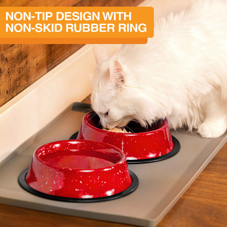 Image of a cat eating from the camping bowls inside on a mat. Text on screen reads: Non-tip design with non-skid rubber ring.