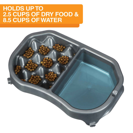 Neater Slow Feeder Double Diner with food and water inside the feeder against a white background. Text on the screen explains the food and water capacity.