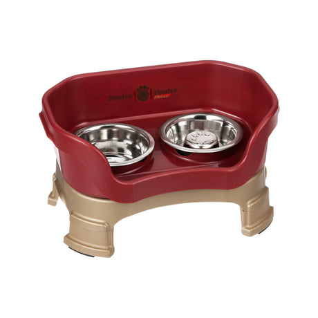 Cranberry SMALL DELUXE LE Neater Feeder with Stainless Steel Slow Feed Bowl and stainless steel water bowl against a white background.