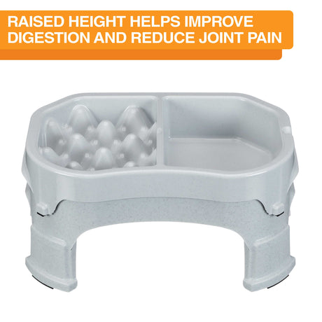 Raised Neater Slow Feeder Double Diner against a white background with text explaining that the height helps improve digestion and reduce joint pain.