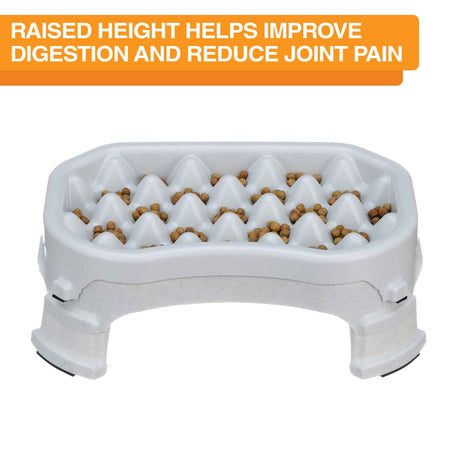 Raised Neater Slow Feeder against a white background with text explaining that the height helps improve digestion and reduce joint pain.