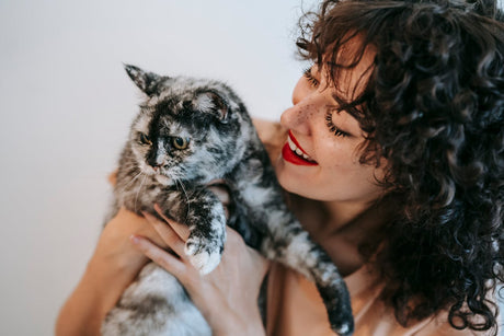 Woman holding a cat