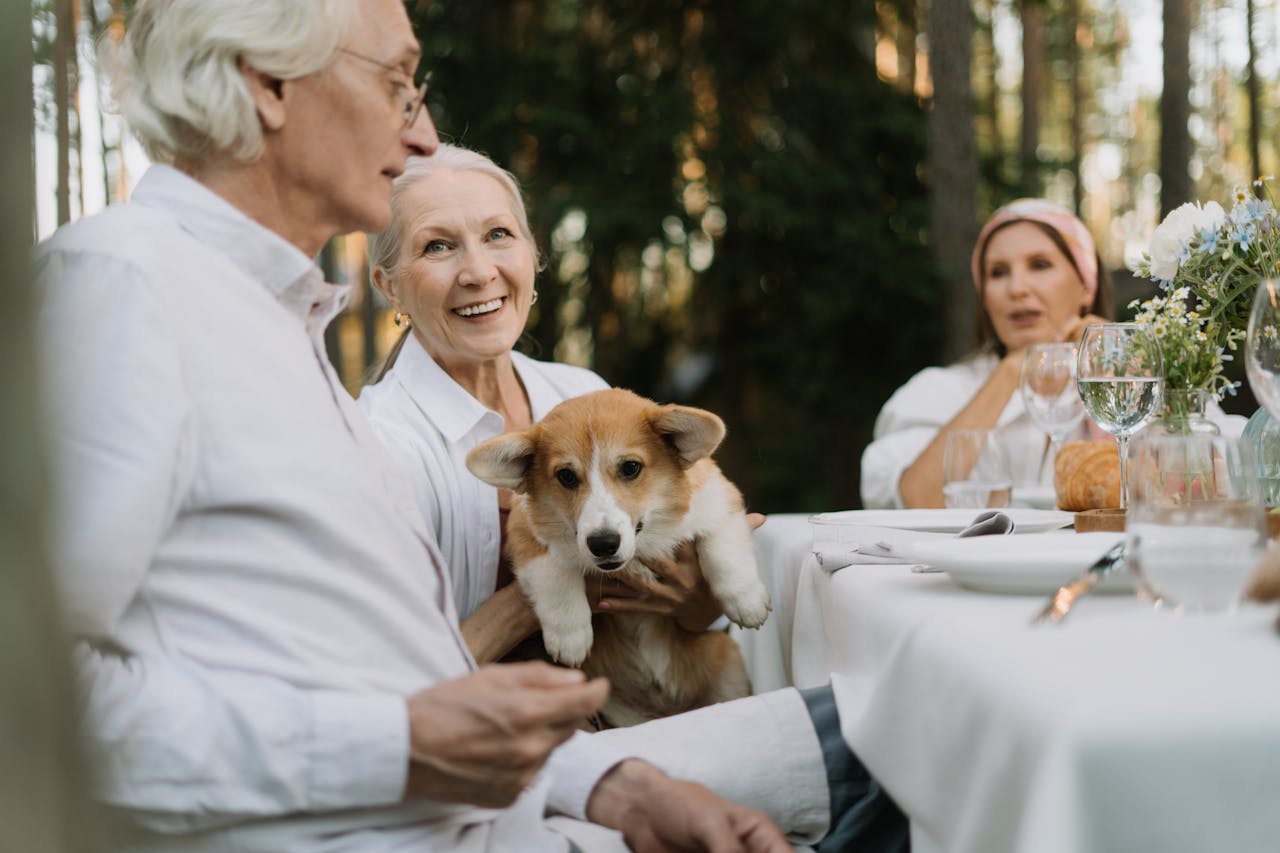 Seniors holding a dog