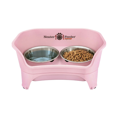 A pink Neater Feeder Express with water on one side and food on the other. 