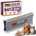 FurDozer X4 Hybrid pet hair remover tool shown with its retail box, plus a golden retriever and a tabby cat on a white background. The product is gray and white rectangular tool with a gold metal rod and rubber edges, and the box highlights a 4-in-1 pet hair remover and auto detailer function.