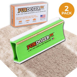 FurDozer X4 Pet Hair Remover and Lint Remover tool shown in front of its retail box on a beige shag rug with a streak of clean carpet under the FurDozer. There is an icon saying that it is a 2 pack. The FurDozer is a green color.