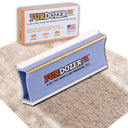 FurDozer X4 Pet Hair Remover and Lint Remover tool shown in front of its retail box on a beige shag rug with a streak of clean carpet under the FurDozer. The FurDozer is a light purple/lavender color.