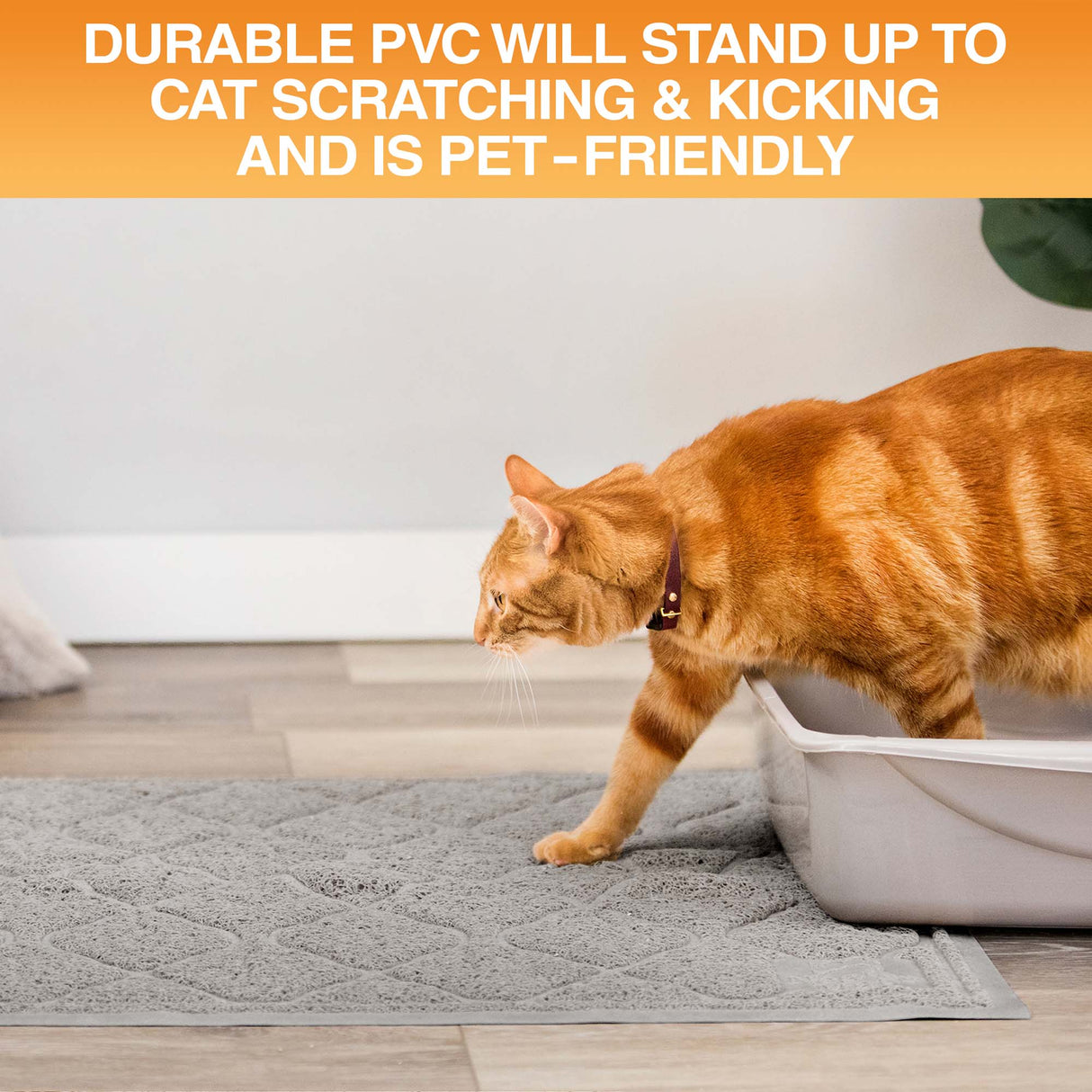 Cat using a litter box on a gray mat with text about durable PVC material