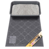 Charcoal cat litter mat with a litter box on top, featuring a brand label with color swatches (pink, beige, gray, charcoal gray, and black).