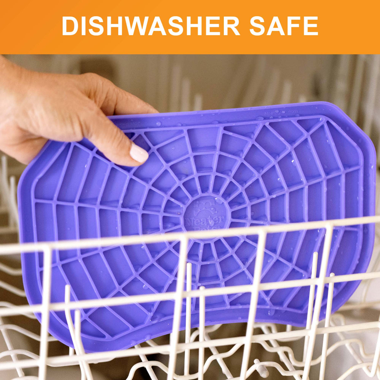 The Neater Pets Neat-Lik Mat being placed on the top rack of the dishwasher