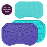 Purple and aquamarine Neat-Lik Express licking mats for dogs and cats, shown face up with the spiderweb licking surface and the suction cups on the back