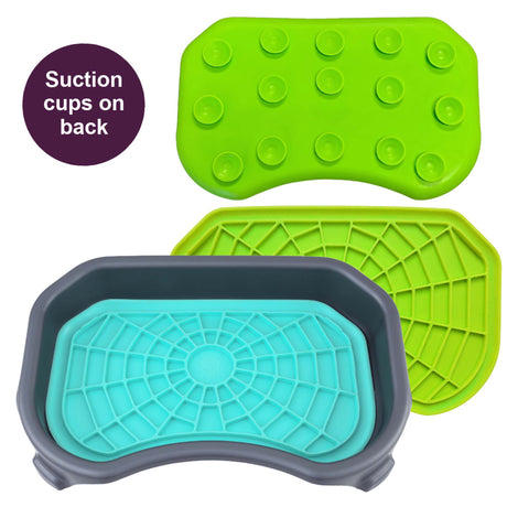 Aquamarine and green Neat-Lik Express licking mats for dogs and cats, with the aquamarine mat shown in its grey mess-proof tray and suction cups on the back
