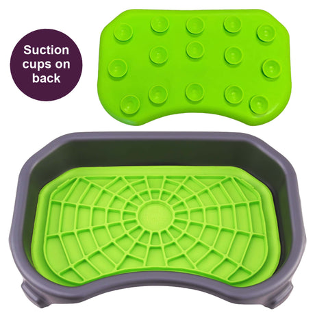 Green Neat-Lik Express licking mat for dogs and cats shown in its grey mess-proof tray, with suction cups on the back of the mat