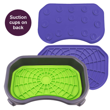 Green and purple Neat-Lik Express licking mats for dogs and cats, with the green mat shown in its grey mess-proof tray and suction cups on the back