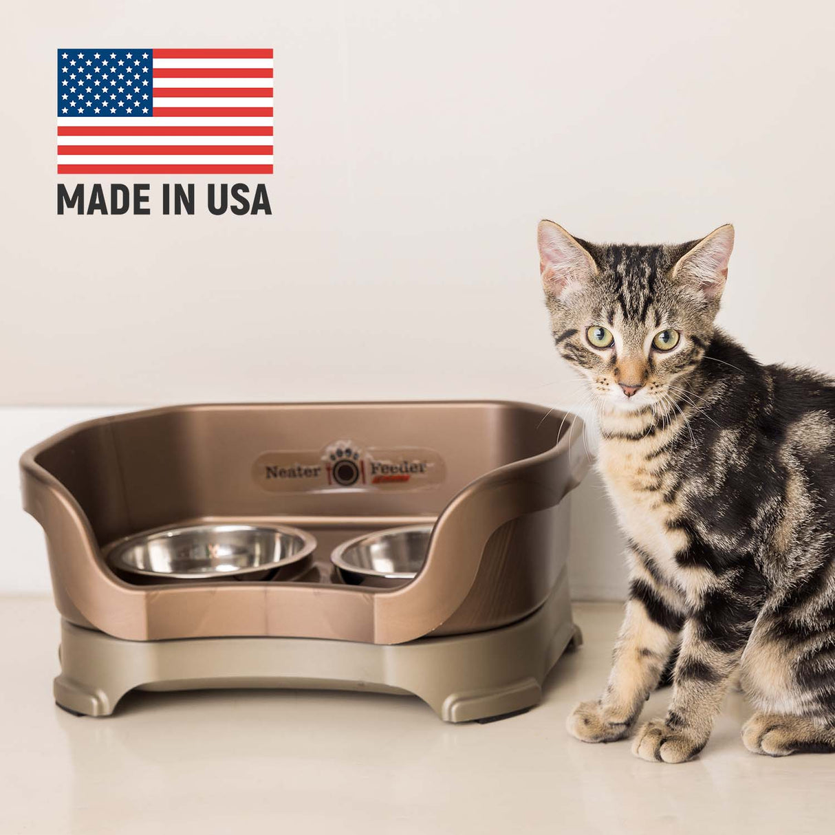 Cat next to Bronze Neater Feeder Deluxe - Made in the USA