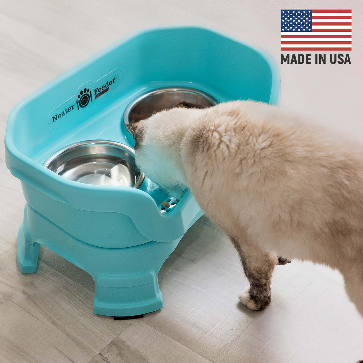 Cat eating from Aquamarine Neater Feeder Deluxe - Made in the USA