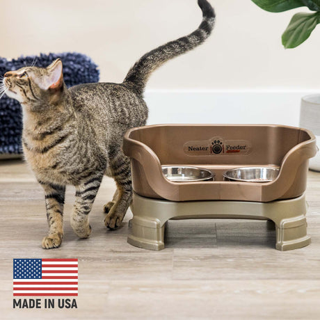 Cat next to Bronze Neater Feeder Deluxe - Made in the USA