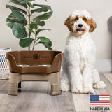 Goldendoodle next to Bronze Neater Feeder Deluxe - Made in the USA