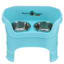 Neater Feeder Deluxe large with leg extensions in Aqua with two stainless steel bowls against a white background.