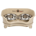 Small almond EXPRESS Neater Feeder with two stainless steel bowls against a white background.