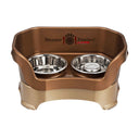 Bronze medium DELUXE Neater Feeder with Stainless Steel Slow Feed Bowl and stainless steel water bowl against a white background.